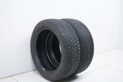 2 pneus hiver Dunlop 215/55 R18 pouces, profondeur de sculpture d'environ 4 mm, DOT19 MO RFT