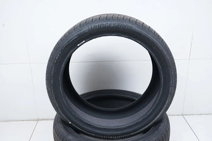 2x DEMO summer tires 265 40 21 inch Bridgestone DOT24 RFT MO