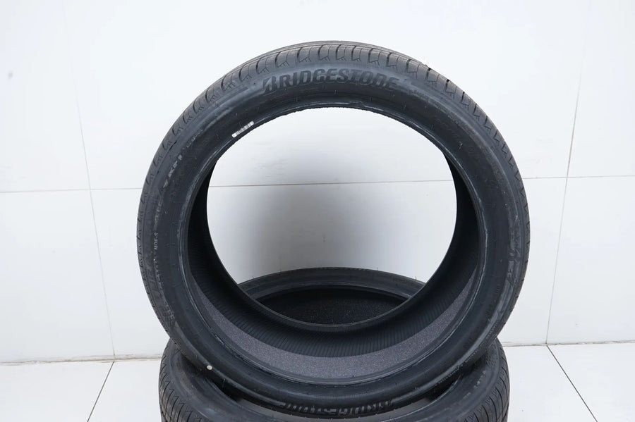 2x DEMO summer tires 265 40 21 inch Bridgestone DOT24 RFT MO