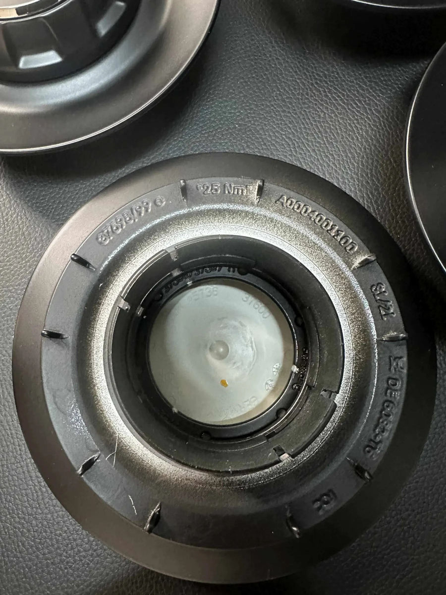 4x Original Mercedes Kreuzspeiche AMG Nabendeckel A0004001100 Schwarz/Matt