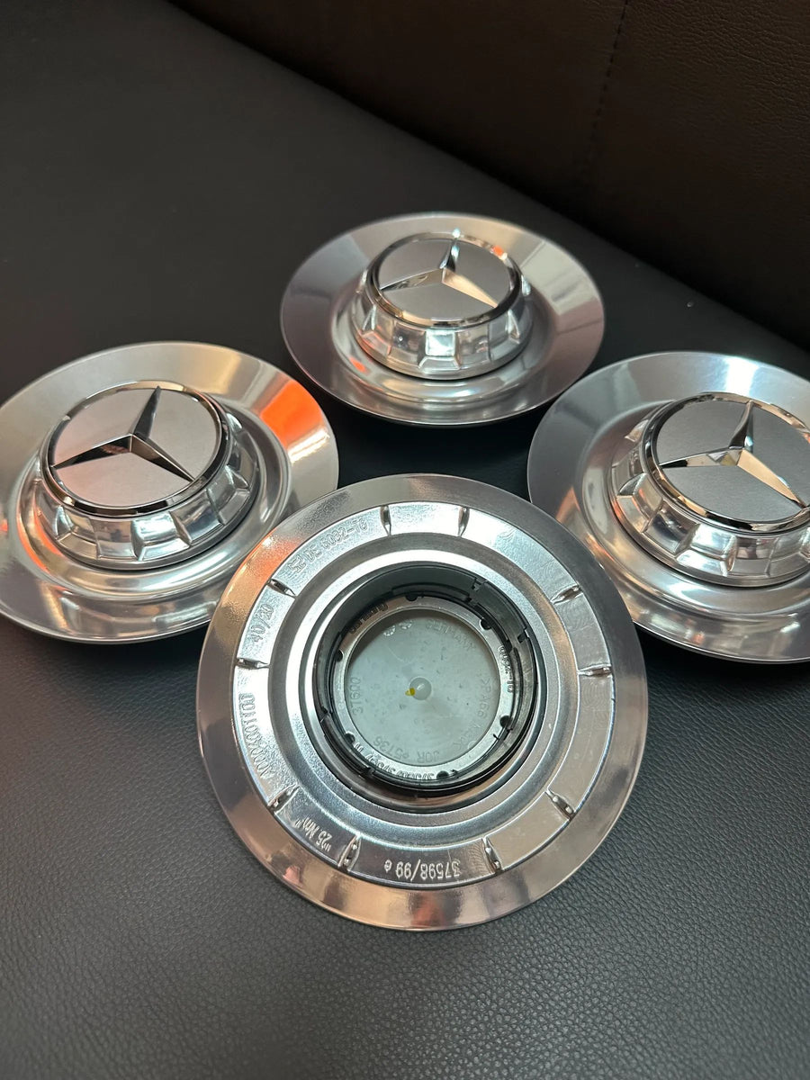 4x Original Mercedes Kreuzspeiche AMG Nabendeckel A0004001100 Silber/Chrom