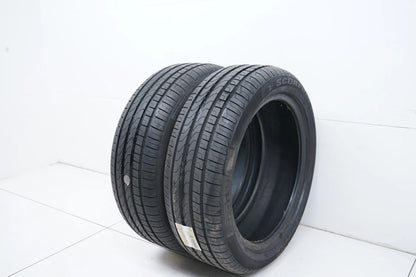 2 pneus été quasi neufs Pirelli DOT18 MO 235/50/20 pouces