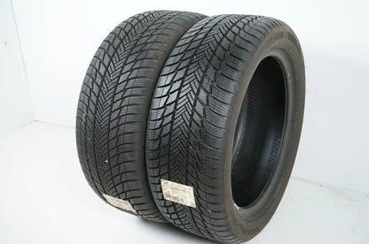 2x Pneus hiver Bridgestone 235 50 19 pouces DOT19 env. 8mm MO