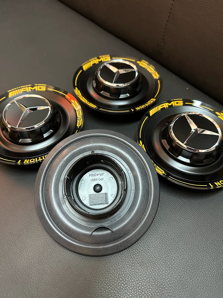 4x Original Wie Neu Mercedes AMG Edition1 Nabendeckel schwarz/Gelb A0004005700