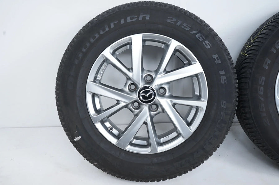 Mazda 3 Allwetterräder mit neuen Allwetterreifen 215 65 16 Zoll 124R-001510