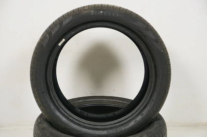 2 pneus été quasi neufs Pirelli DOT18 MO 235/50/20 pouces